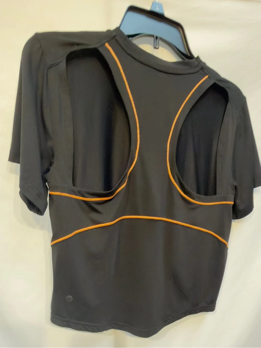 Lululemon Ventilated Open-Back Training T-Shirt in Black with Orange Soda trim
